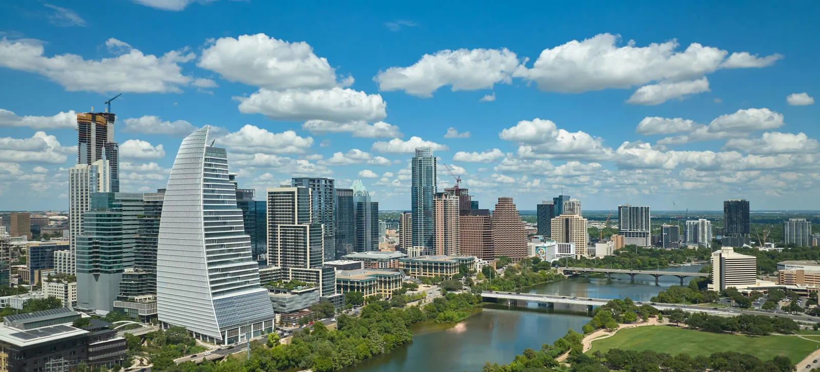 Downtown Austin skyline over Lady Bird Lake — home of Levesque Plastic Surgery
